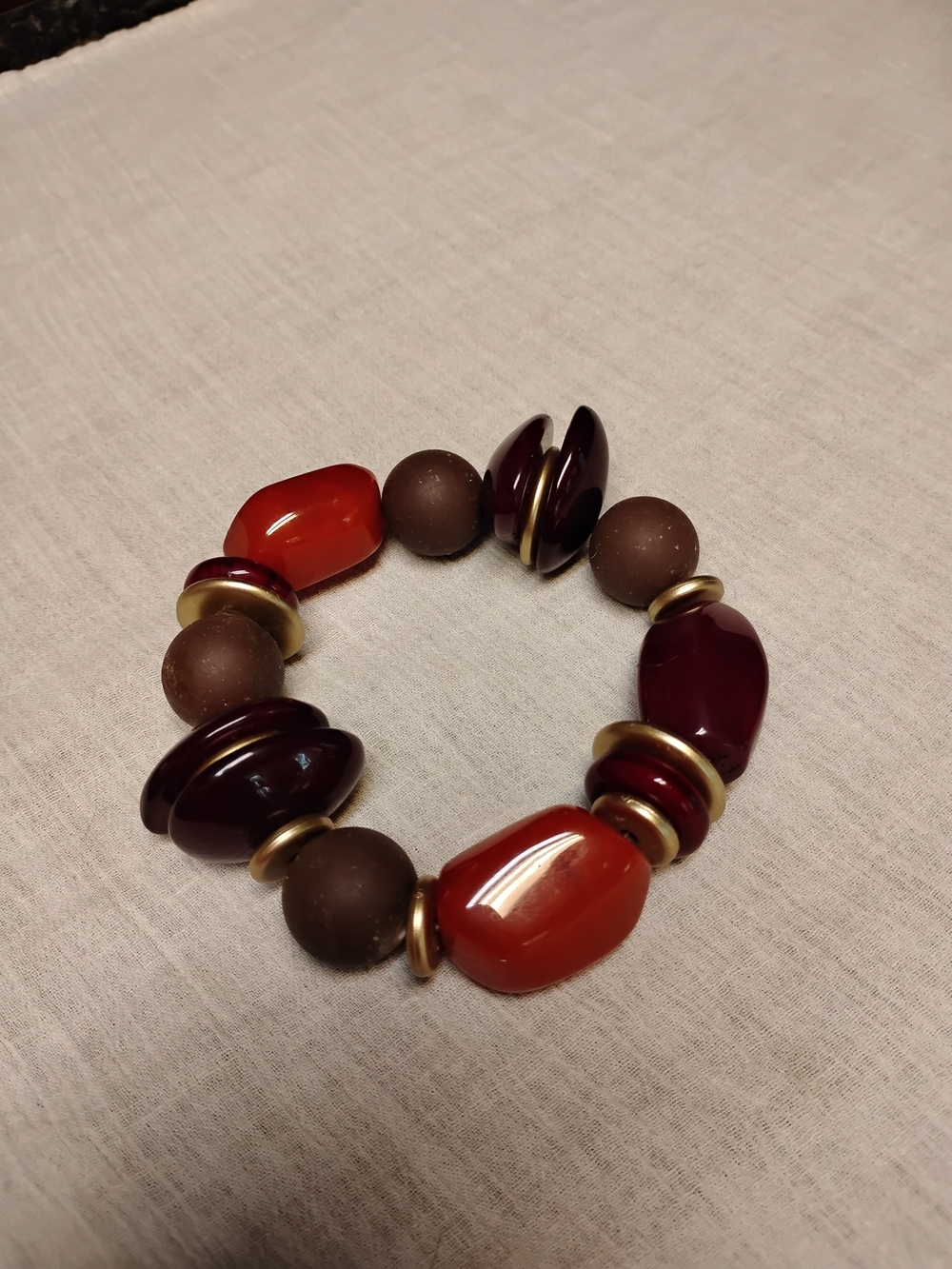 Stretch Beaded Bracelet with Red, Brown, & Gold Accents